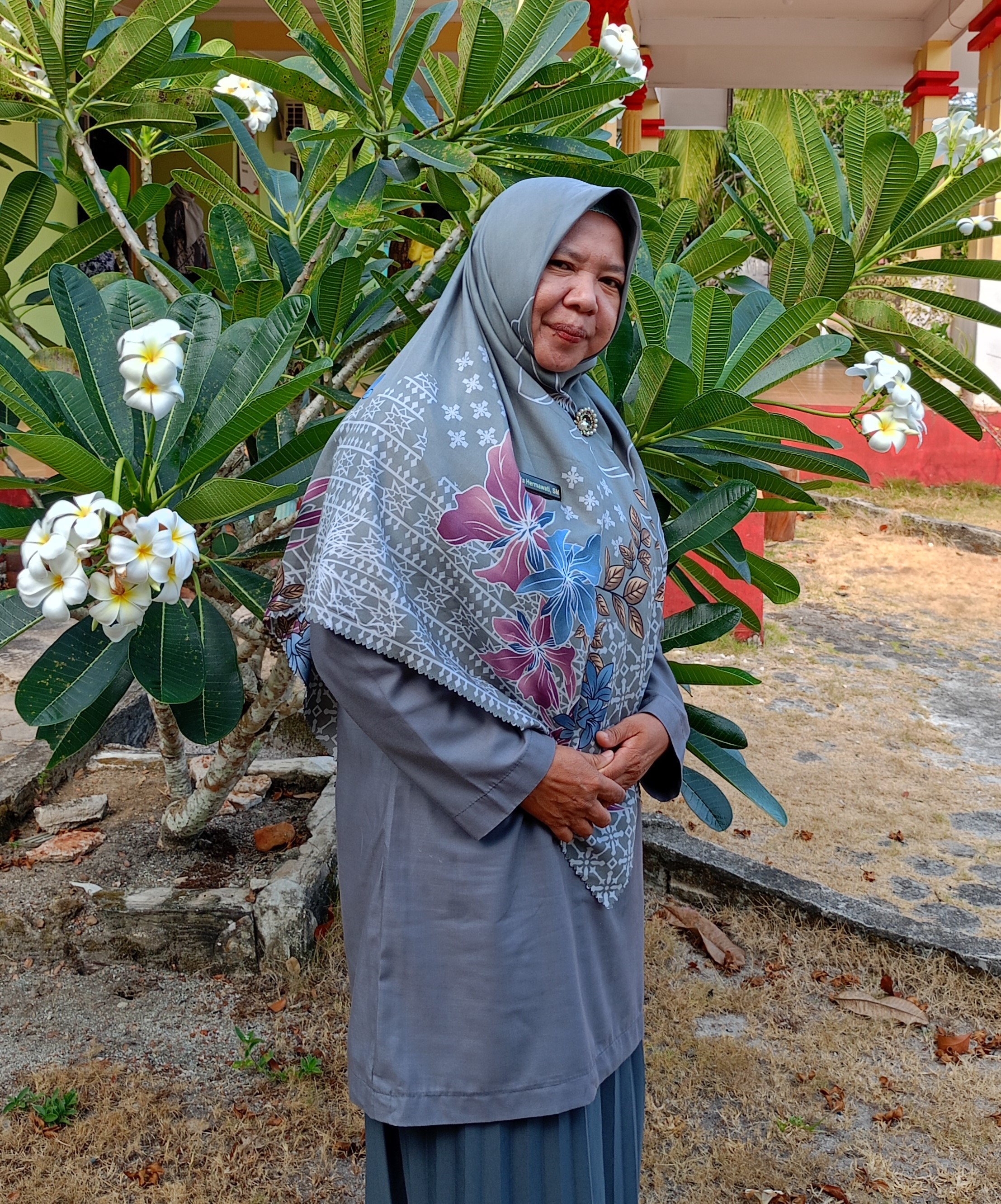 YULIA HERMAWATI, S.M.